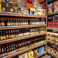 Neat stacked shelves of Belgian beers